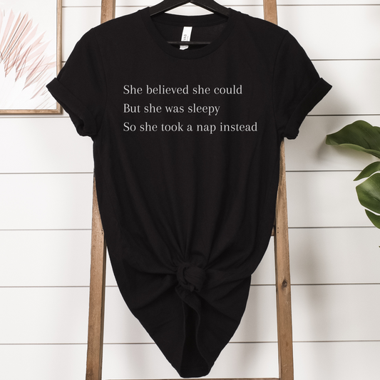 T shirt with the saying "She believed she could but she was sleepy so she took a nap instead"
